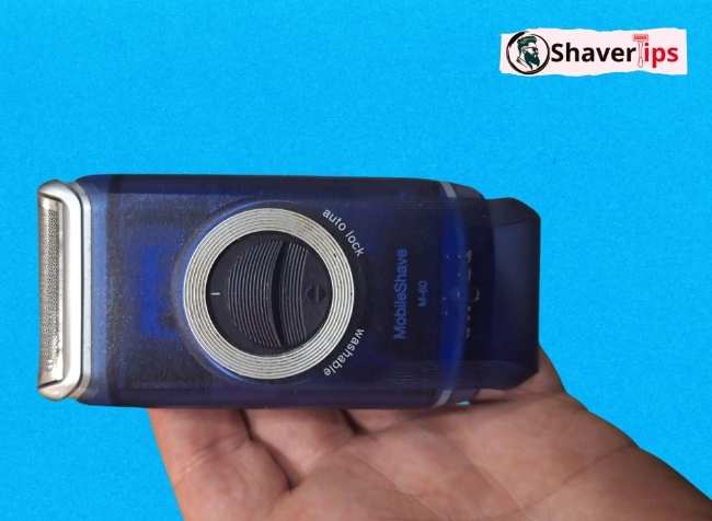 Braun Pocket Foil Shaver held in hand