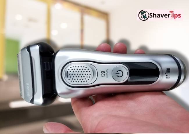 Braun Series 9 Pro 9487cc held in hand for size reference