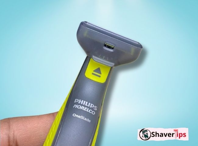 Philips Norelco shaver with cover, angled view